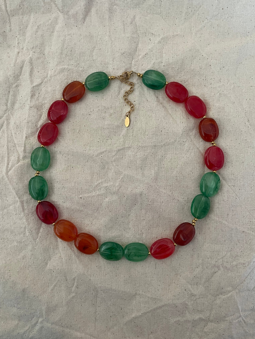 Collier perles plates
