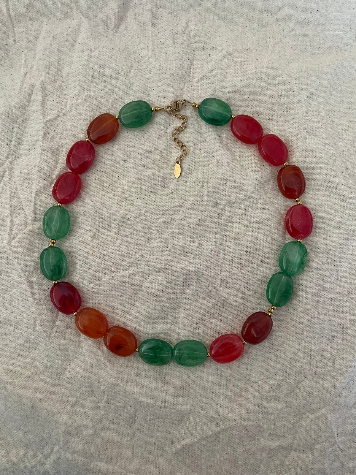 Collier perles plates