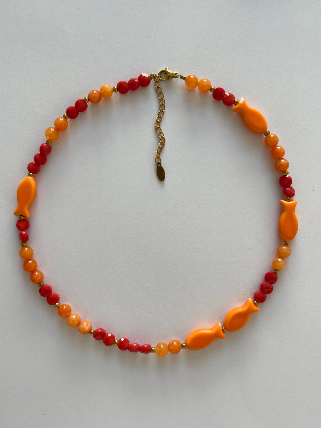 Collier perles et sardines