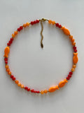 Collier perles et sardines