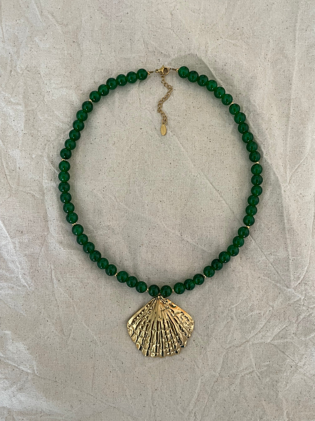 Collier pendentif coquillage doré