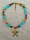 Collier coloré étoile de mer dorée
