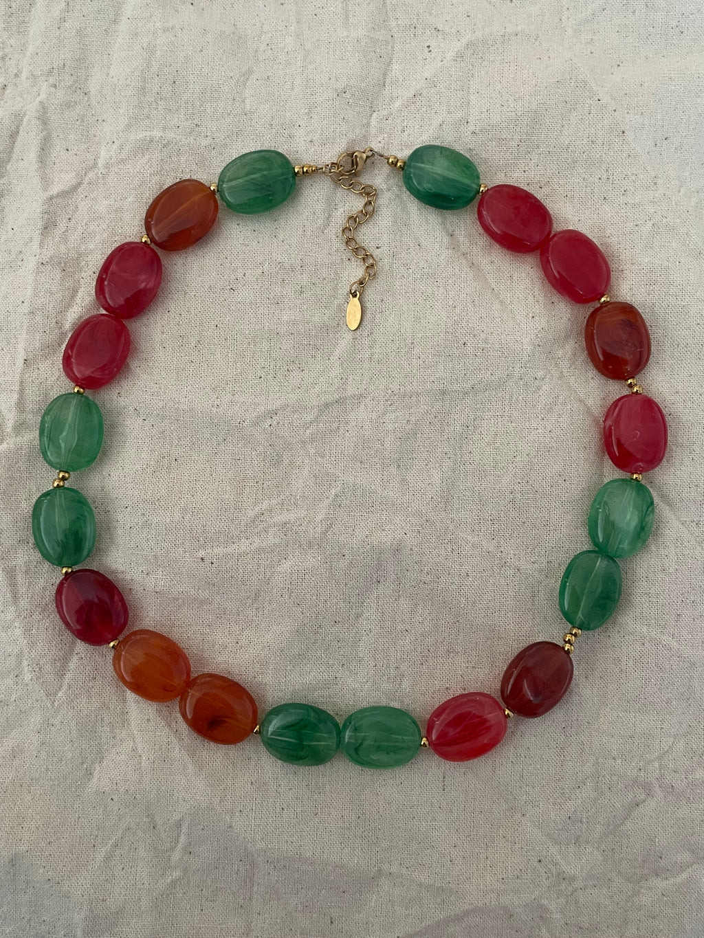 Collier perles plates