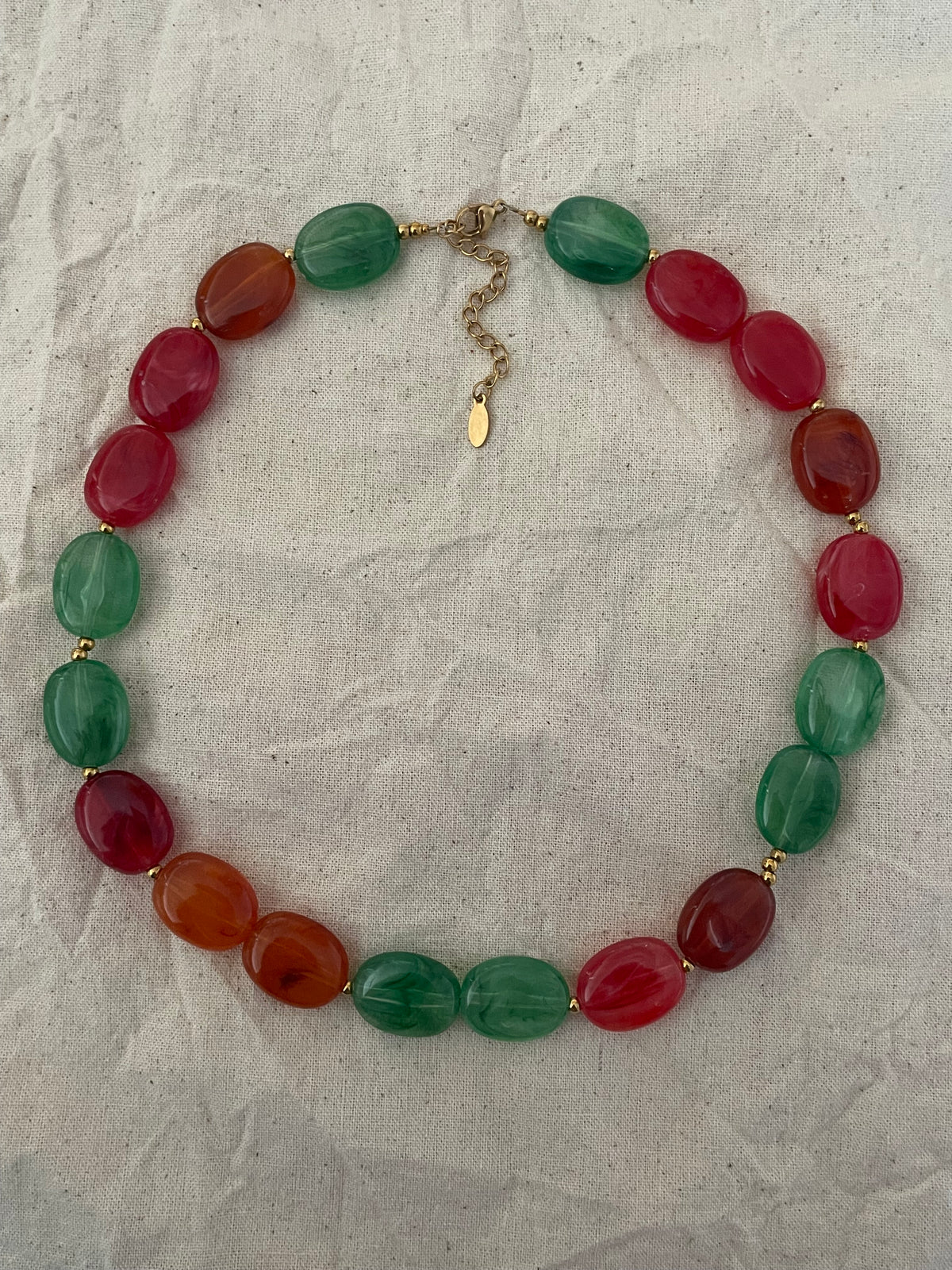 Collier perles plates
