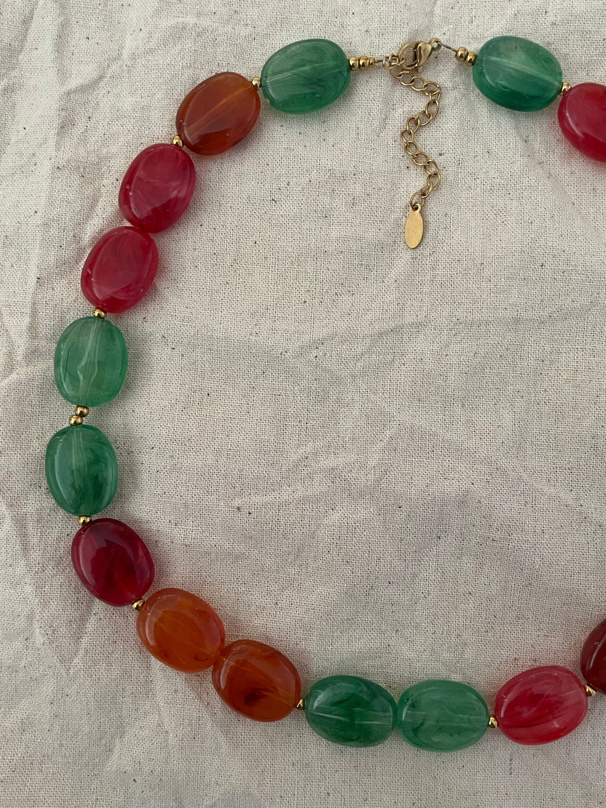 Collier perles plates