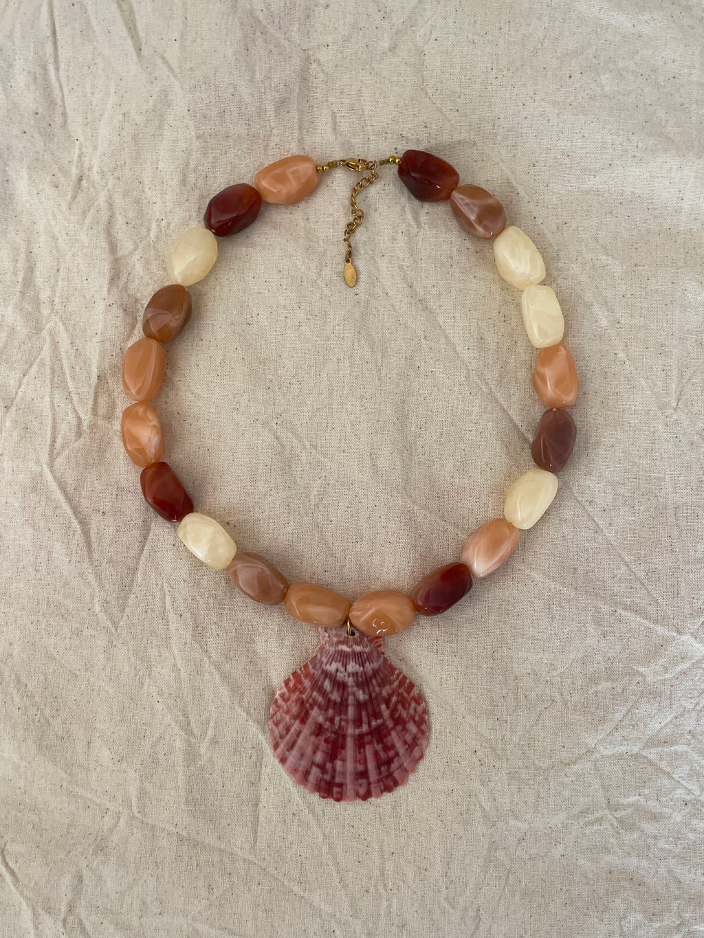 Collier pendentif palourde
