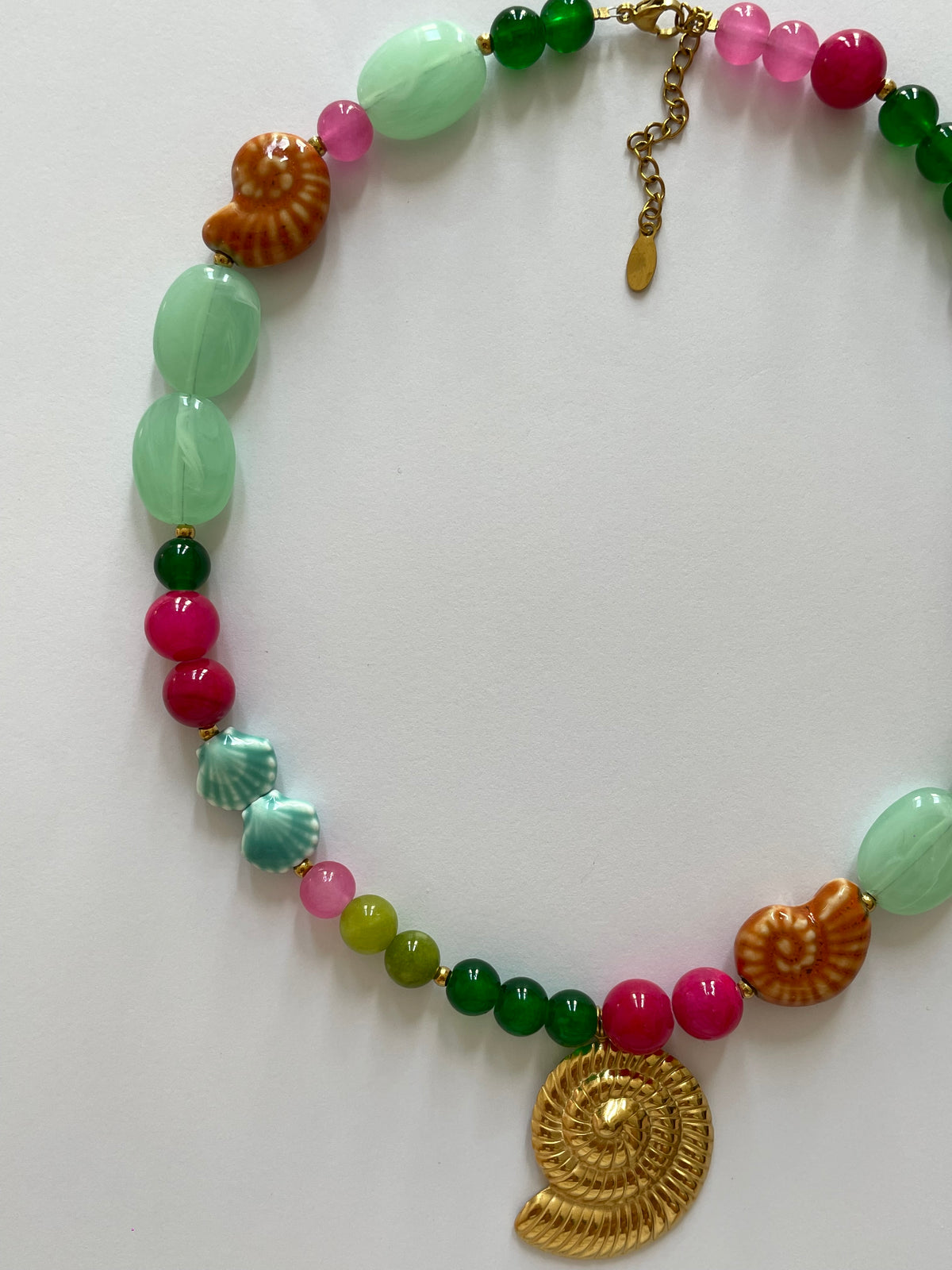 Collier coquillage escargot doré