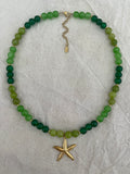 Collier vert pendentif étoile de mer dorée